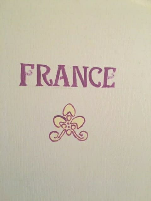 Image of a door with France painted on it.