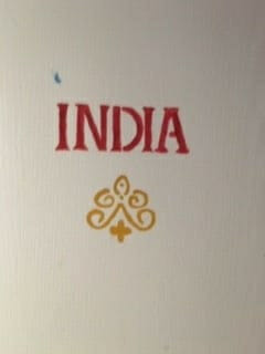 Image of a door with India painted on it.